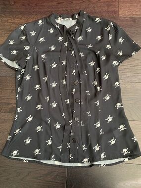Unique Vintage tie neck skull blouse